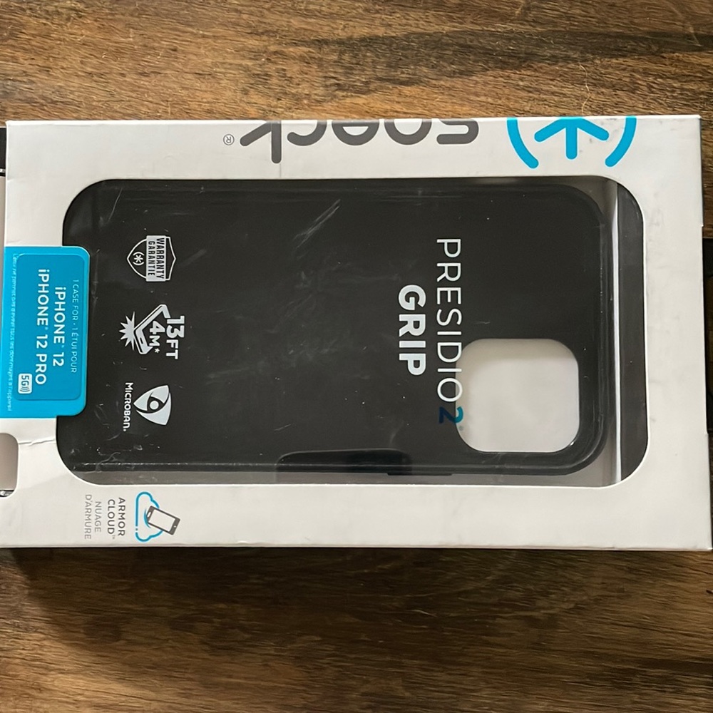 Black iPhone 12 speck case. Never used.